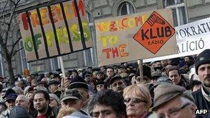 A placard in support of Klub Radio is brandished at an opposition rally in Budapest, 22 January 2012