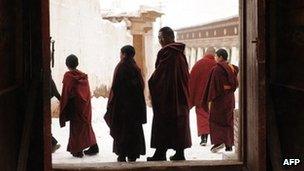 In this picture taken on March 9, 2012 Tibetan monks leave after taking part in a ceremony at Lajia Monastery in China's northwest Qinghai province (file photo)