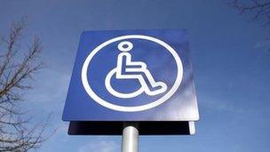 Sign a0bove disabled parking bay