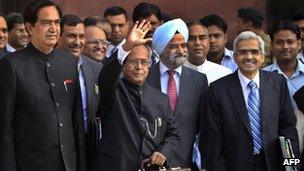 Indian Finance Minister Pranab Mukherjee arrives to present the budget