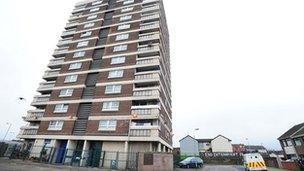 The apartment block where a man's body was found