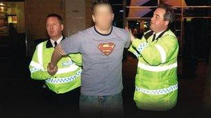 A man being arrested by police