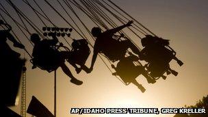 People on swings