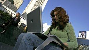 Woman using a wi-fi hotspot