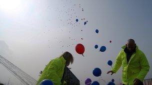 Balloons being released