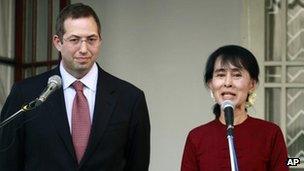 Burma opposition leader Aung San Suu Kyi, right, with Derek Mitchell, left, US special envoy to Burma, on 14 March, 2012, in Rangoon