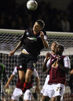 Harry Pell playing for Hereford against Northampton