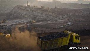 A truck full of coal at an open-cast coal mine in eastern Indian state of Jharkhand.