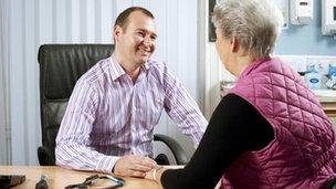 Doctor with elderly patient