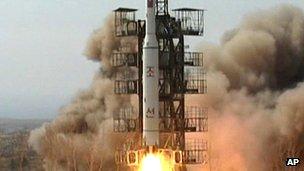 A rocket lifts off from its launch pad in Musudan-ri, North Korea, April 2009