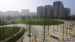 The Olympic Park is seen from the balcony in the athletes' village