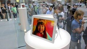 Customers outside an Apple store in Sydney to get their hands on the latest iPad