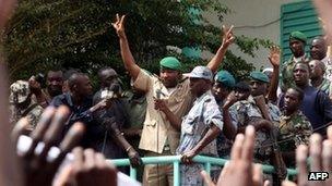 An unidentified leader of the March 22 Popular Movement addresses thousands marching in Bamako in support of Mali's coup leaders