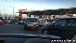 A queue of vehicles waiting to buy fuel at a petrol station in Monks Cross, York.