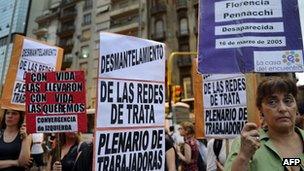 Campaigners in Argentina hold up banners with the names of missing people, 3 Nov 2010