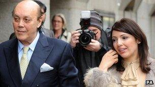 Asil Nadir arrives with his wife Nur at the Old Bailey in London in 2011