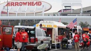 Tailgating party in the parking lot at Kansas City Chiefs stadium