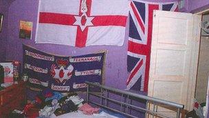 Bedroom of one of the accused with Loyalist flags on wall