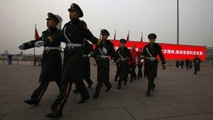 Paramilitary policemen patrol on Tiananmen Square - archive image