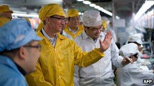 Apple boss Tim Cook visits a Foxconn manufacturing facility in Zhengzhou, China