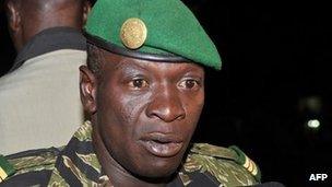 Malian junta leader captain Amadou Sanogo speaks after his meeting with Burkina Faso's Foreign Minister Djibril Bassole at the Kati military camp near Bamako on 31 March 2012