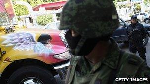 Mexican soldier at site of suspected drug execution in Acapulco. Feb 2012