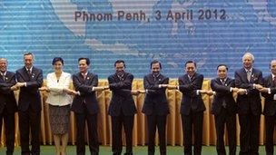 Southeast Asian leaders pose for a group photo during the 20th Association of South east Asian Nations summit in Phnom Penh