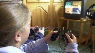 Girl playing on Play Station