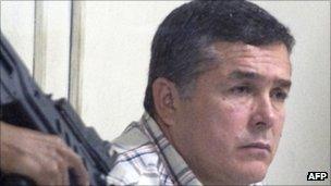 Alleged Guatemalan drug trafficker Horst Walther Overdick under armed guard in Guatemala City.