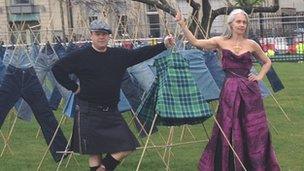 Professor Helen Storey and Professor Tony Ryan in their field of kilts and jeans in St Andrew Square