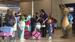 Peter Rabbit entertains children at Heathrow airport