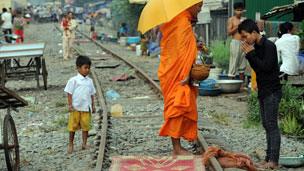 Monk appealing for alms