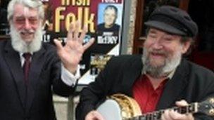 Barney McKenna, right, serenades fellow Dubliner Ronnie Drew, also deceased