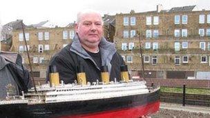 Cliff Ismay with a model of the Titanic