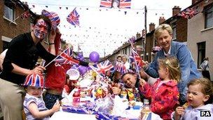 Locals celebrate Queen Elizabeth II's Golden Jubilee at a street party in south Belfast