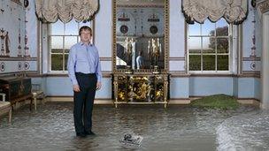 Man standing in 18th Century room ankle deep in water