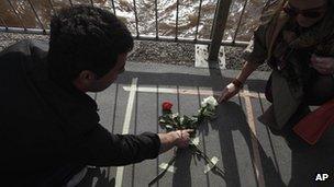 Floral tributes are placed on a bridge in Sarajevo, 6 April 2012