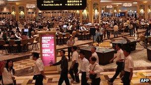 Customers at a casino in Macau