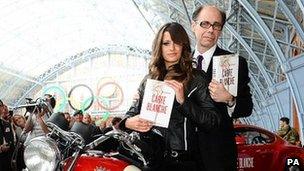 Thriller writer Jeffery Deaver arrives with a Bond girl to promote his new James Bond novel