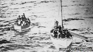 Lifeboats carrying Titanic passengers approaching the SS Carpathia