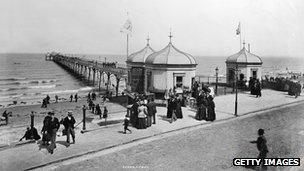 People walking along the promenade beside the pier at Redcar, Cleveland circa 1890. Photo: Hulton Archive/Getty Images