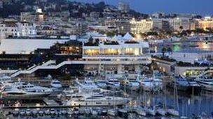 Luxury yachts are moored in the port of Cannes