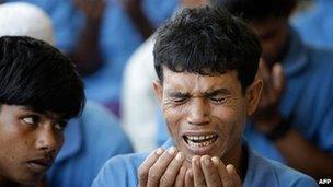 A Rohingya refugee prays in Friday prayers