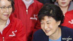 Park Geun-hye , interim leader of the ruling Saenuri Party, and party members in Seoul 11 April, 2012