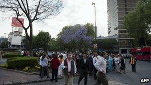 People gather in a park after an earthquake in Mexico City, 11 April, 2012.