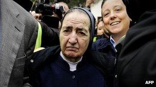 Sister Maria Gomez leaving court after being questioned over the alleged theft of a baby in the 1980s