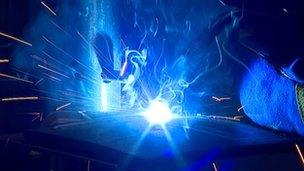 Welder and sparks