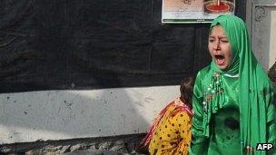 Tarana Akbari crying after a suicide bomber's attack at a shrine in Kabul