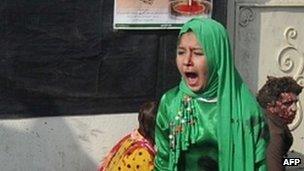 Tarana Akbari crying after a suicide bomber's attack at a shrine in Kabul