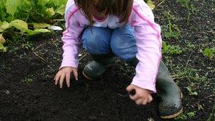 Girl with earthworm